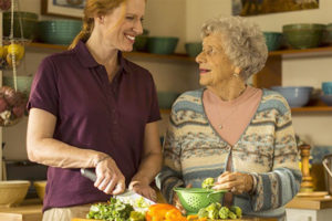 Mother and daughter cooking