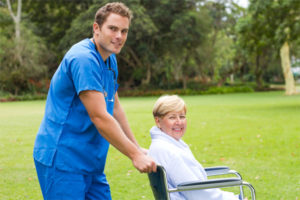 Nurse helping elderly patient